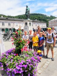 Our camp-kids on a Mozart square in Salzburg (Austria)